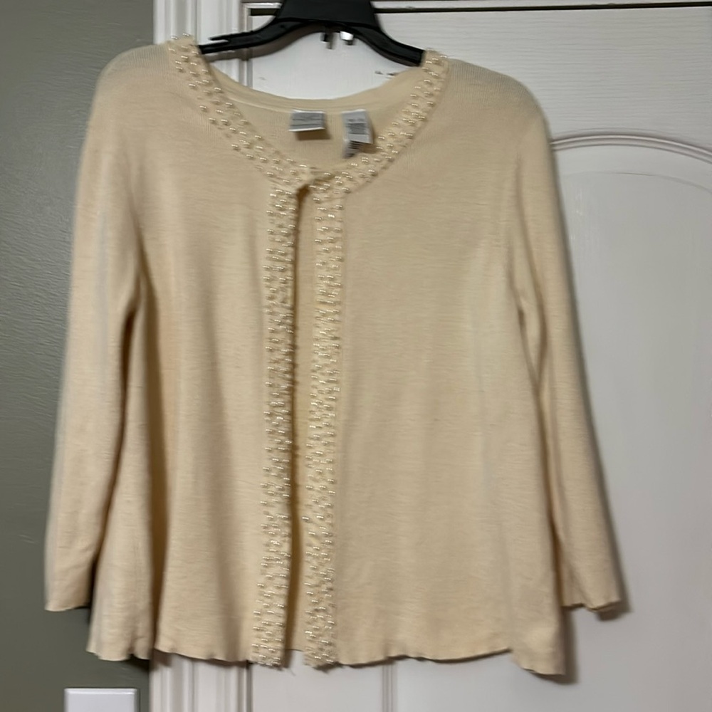 Very Pretty Yellow Sweater with pearls around neck line and down the front.